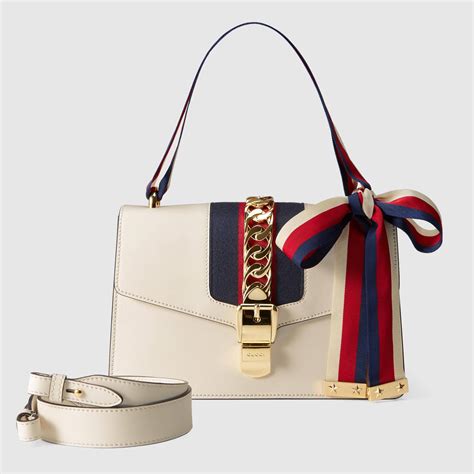 gucci サイズ表|white Gucci bag.